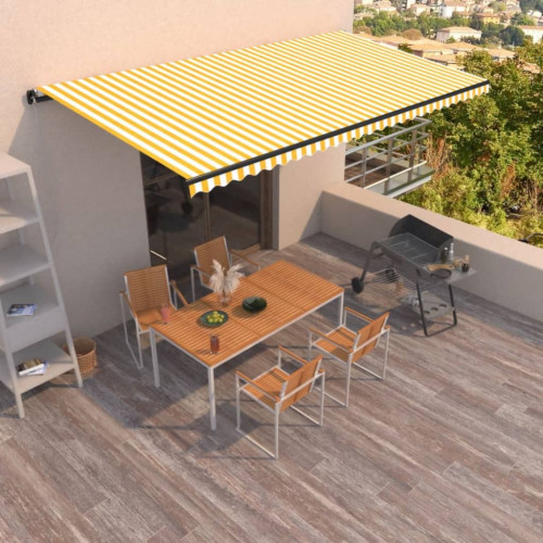 vidaXL Ručne zaťahovacia markíza 600x350 cm žltá a biela